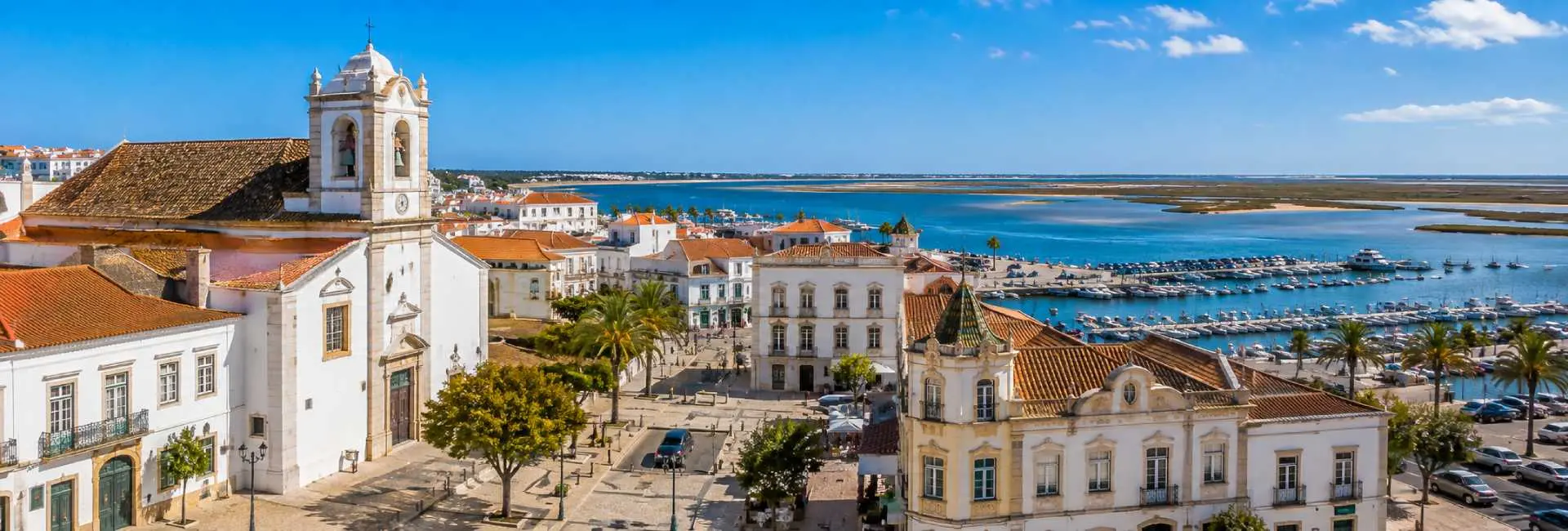 Faro, Portugal, with its historic old town, cathedral, terracotta rooftops and Ria Formosa lagoon