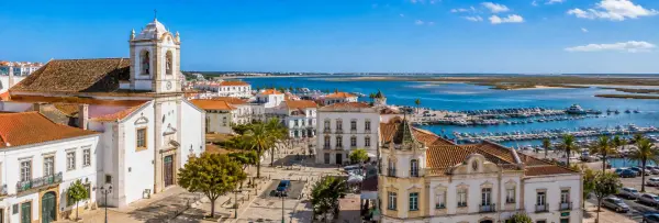 Faro, Portugal, with its historic old town, cathedral, terracotta rooftops and Ria Formosa lagoon