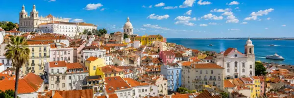 Lisbon panoramic cityscape with colorful rooftops and the Tagus River