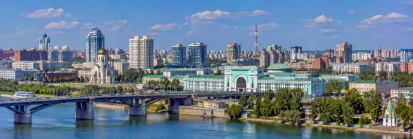 Novosibirsk, Russia skyline with the Ob River, bridge, historic landmarks and modern buildings