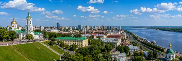 Perm city skyline with the Kama River, historic church and green riverside landscape in Russia