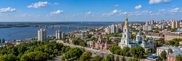 Saratov, Russia skyline along the Volga River with historic architecture and a scenic bridge