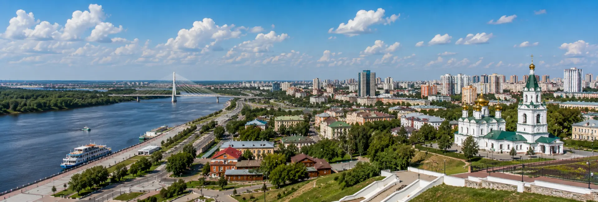 Tyumen, Russia skyline with the Tura River, historic architecture, and modern cityscape