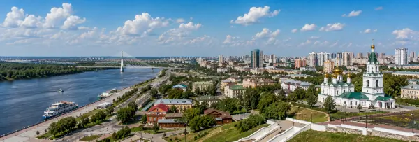 Tyumen, Russia skyline with the Tura River, historic architecture, and modern cityscape