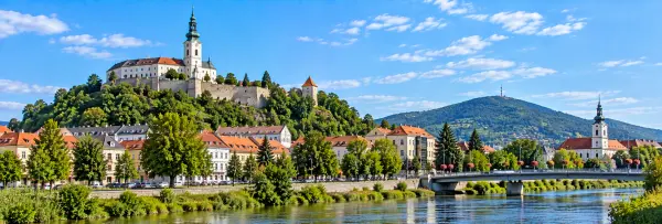 Nitra, Slovakia, with Nitra Castle, Zobor Mountain, historic rooftops and the Nitra River