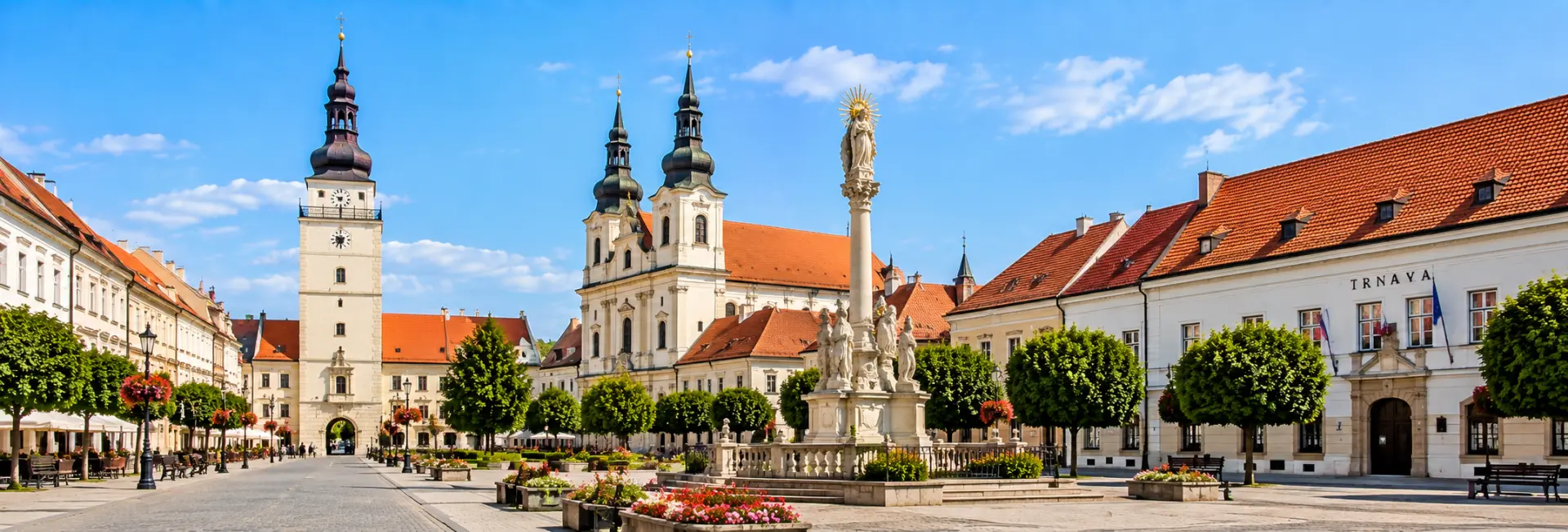 Trnava, Slovakia, with the historic Town Tower, Trinity Square and Baroque church
