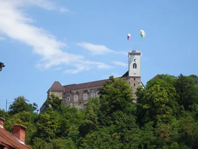 Ljubljana Castle rising above the trees on Castle Hill in Slovenia