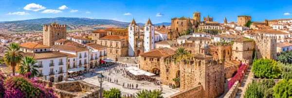 Panoramic view of Cáceres, Spain, showing its medieval old town, stone towers, churches and terracotta rooftops