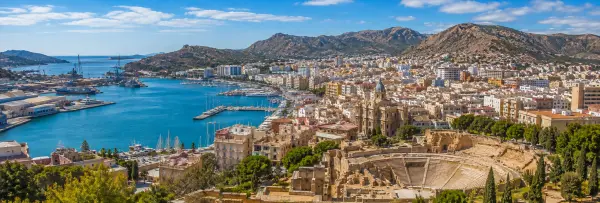 Cartagena, Spain skyline with Roman Theatre, historic city and Mediterranean harbor