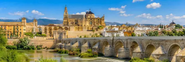 Mosque-Cathedral and Roman Bridge in Córdoba, Spain, beside the Guadalquivir River