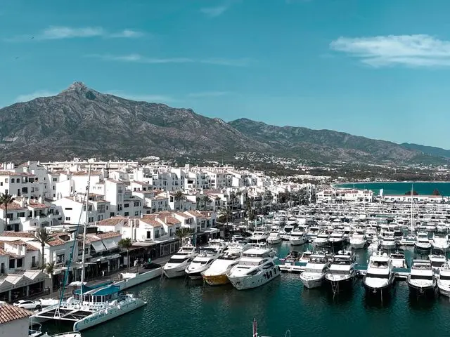 Puerto Banús marina with luxury yachts and La Concha mountain in Marbella, Spain