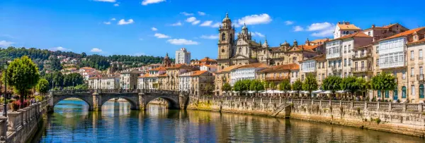 Pontevedra, Spain, with its historic old town, stone bridge, riverfront, and Basilica of Santa María