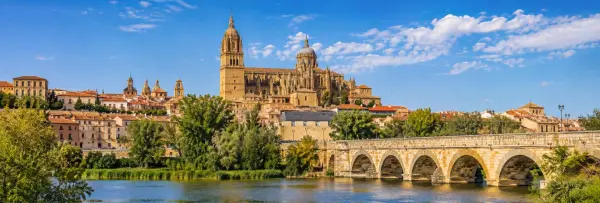 Salamanca, Spain panoramic view of the historic city, cathedral, Roman Bridge and Tormes River