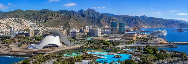 Santa Cruz de Tenerife skyline, harbor, mountains and waterfront in bright daylight