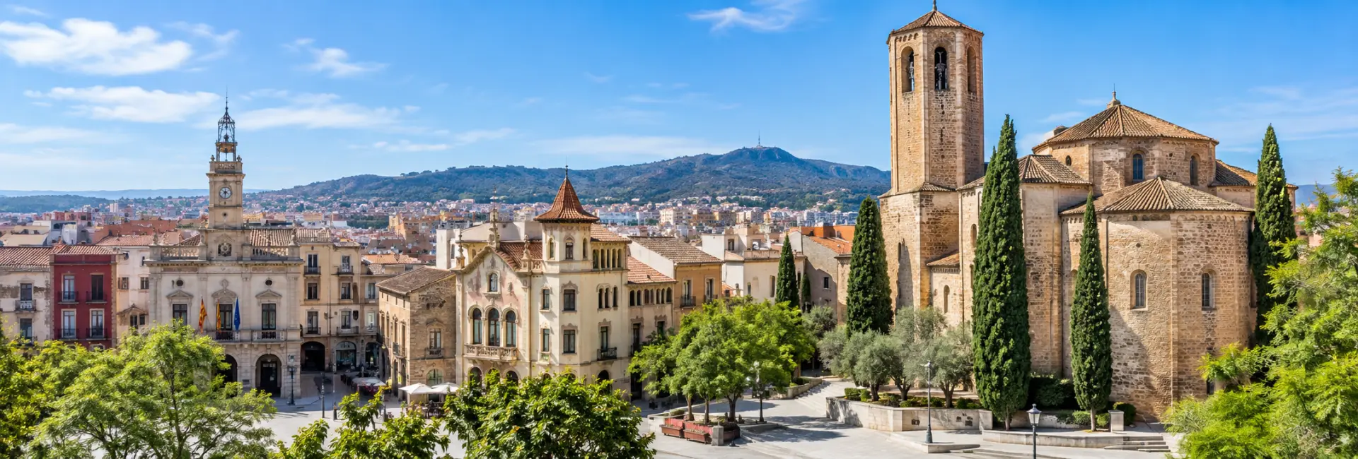 Historic center of Terrassa, Spain, featuring Sant Pere church and surrounding cityscape