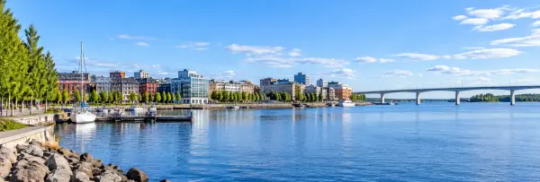 Luleå, Sweden waterfront with city skyline, marina, Baltic water and Bergnäsbron