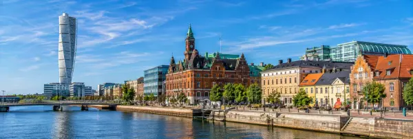 Malmö, Sweden, featuring Turning Torso, historic waterfront buildings, and the city canal