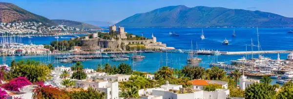 Bodrum Castle overlooking the turquoise Aegean Sea and marina in Türkiye