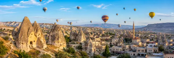 Cappadocia fairy chimneys, cave dwellings and hot air balloons in Türkiye