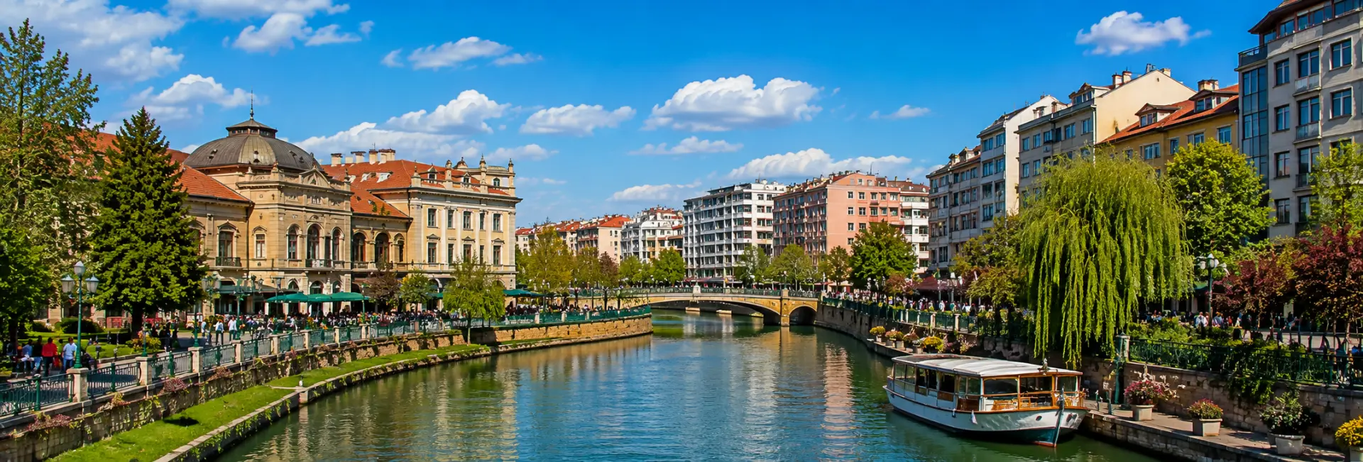 Porsuk River with historic buildings, bridges and waterfront promenade in Eskişehir, Turkiye
