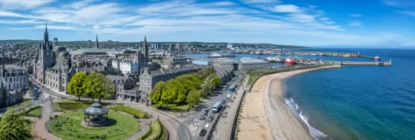 Aberdeen, United Kingdom skyline, harbor and sandy beach on a bright sunny day