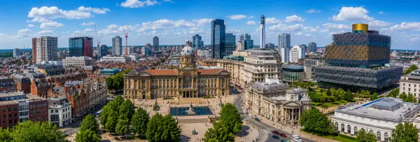 Panoramic cityscape of Birmingham, United Kingdom, with historic buildings and modern skyline