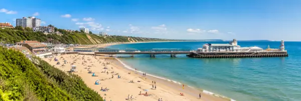 Bournemouth Beach and iconic pier along the sunny Dorset coastline in England