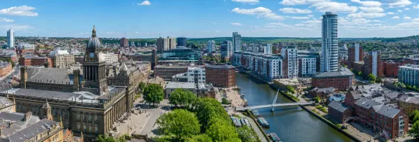 Aerial panoramic view of Leeds, United Kingdom, showing its historic architecture and modern skyline
