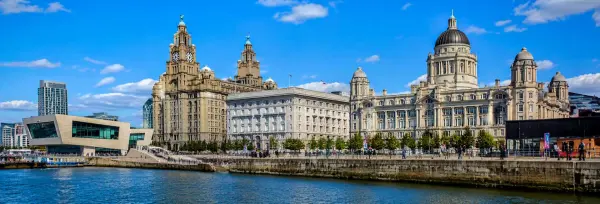 Liverpool waterfront with the iconic Royal Liver Building and historic Pier Head buildings