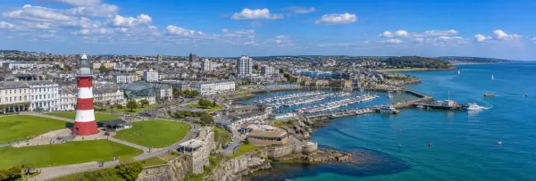 Plymouth, United Kingdom coastal skyline, marina, lighthouse and waterfront
